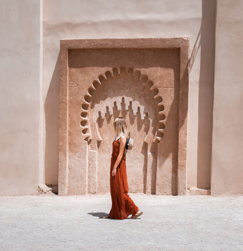 Woman walking in a foreign location.
